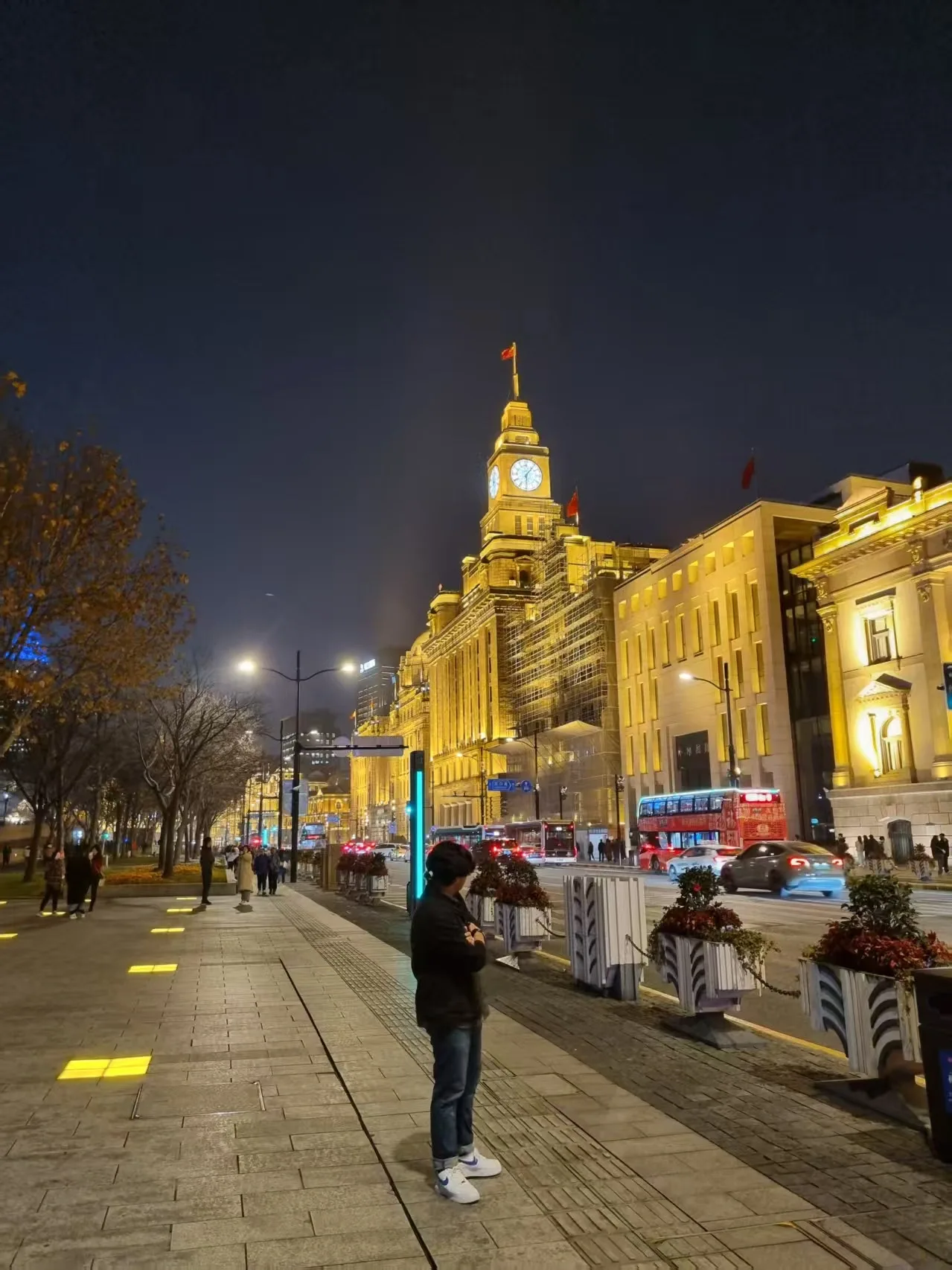 A travel portrait on the Bund at night